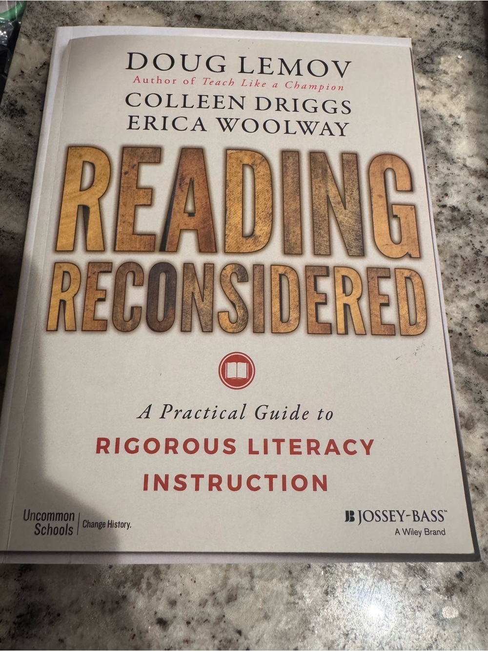 "Reading Reconsidered" paperback  - White with Gold Text